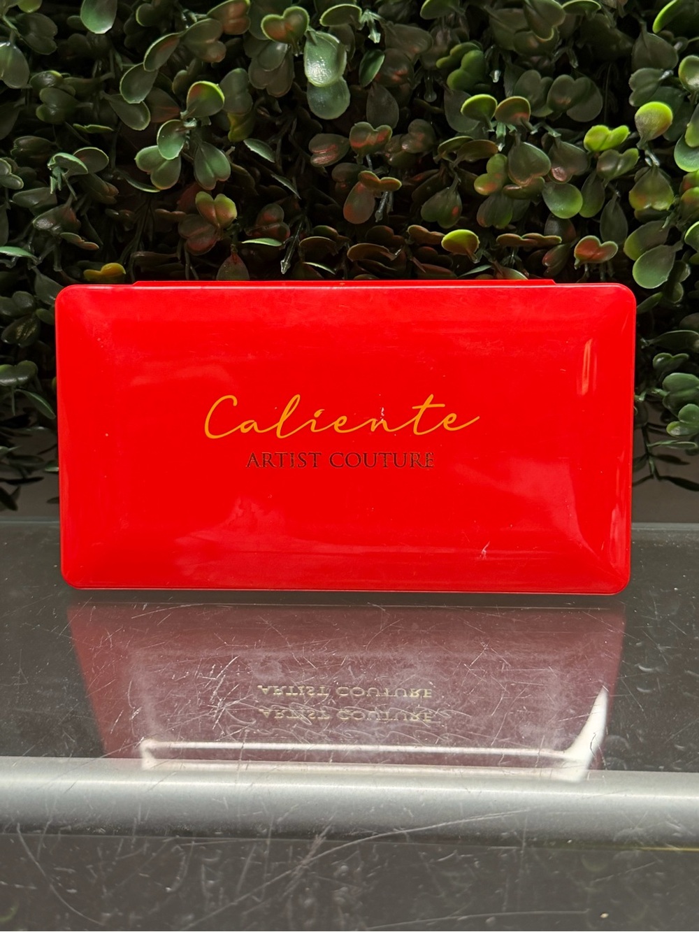 Artist Couture Caliente Eyeshadow Palette in Vibrant Red with Gold Script